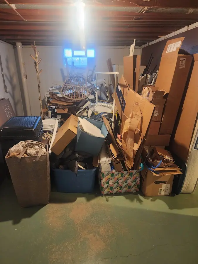 Roll-off dumpster container at job site for 8 Yard Dumpster Rental in Melrose